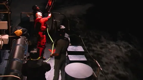 Rescue helicopter of SAR training after twilight. Stock Footage 107315616