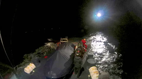 Rescue helicopter of SAR training after twilight. Stock Footage 107315665