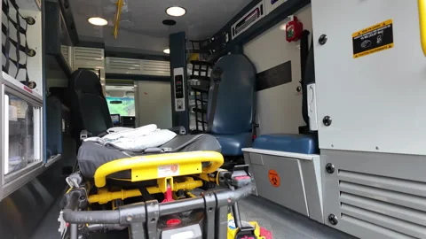 Rescue services Inside of private ambulance descent gimbal shot Stock Footage 293634129
