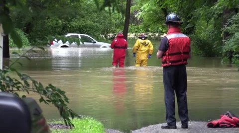 Rescue squad during a flood Stock Footage 64792907