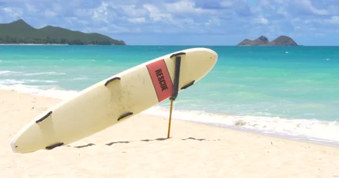 Rescue Surfboard on the Hawaii beach Stock Footage 66568272