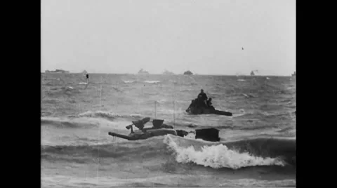 Rescue team arriving to rescue military tank in English Channel Stock Footage