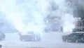 Rescue team extinguishes car fire, stunt show, sporting event HD Footage