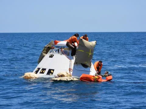 Rescue team members are using a Boeing CST-100 Starliner training capsule t.. Stock Photos