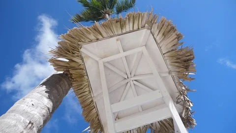 Rescue tower on blue sky background | Stock Video | Pond5