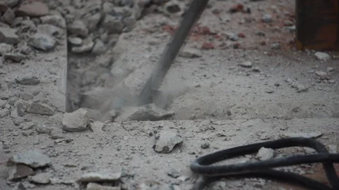 Rescue workers are using tools to break concrete from the earthquake Stock Footage 248237928