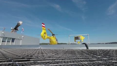 Rescue yellow helicopter taking off for an emergency. Stock Footage 232844662