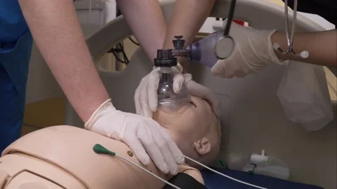 Rescuer hands doing emergency CPR. First Aid Training. Video stock 142606439