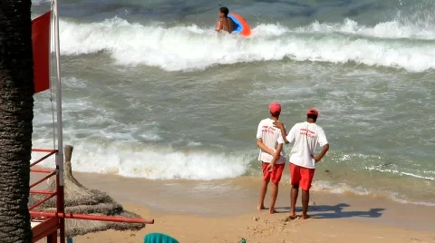 Rescuers on the beach Video stock 772045