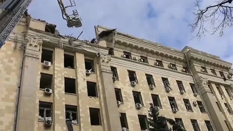 Rescuers clear rubble after being hit by Russian missiles 6 Stock Footage 188749253