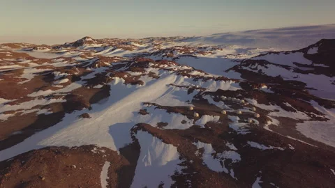 Research activities at an Antarctica camp base surrounded by snow and mountains Stock Footage 288156546