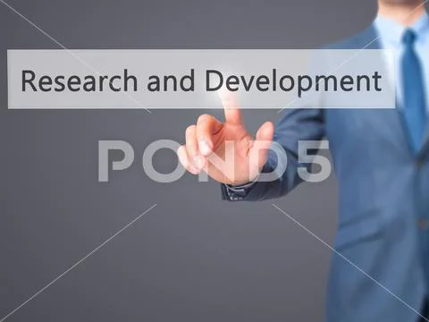 Research and Development - Businessman press on digital screen. Stock Photos