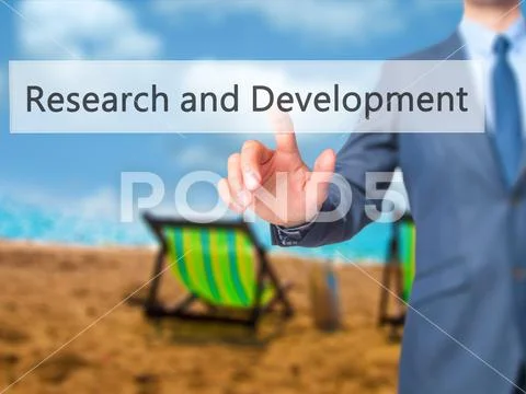 Research and Development - Businessman press on digital screen. Stock Photos