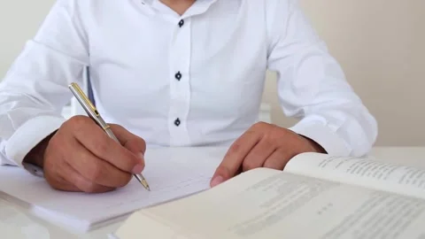 Research and Study Session at a Workspace Video stock 346182719