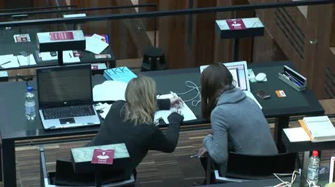 Research by computer in the Jacob and Wilhelm Grimm-Center in Berlin Vídeo Stock 11492980