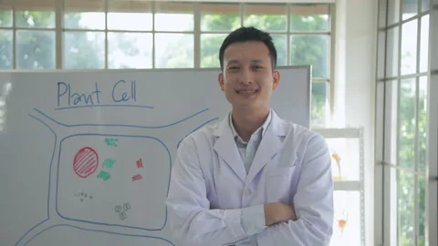 Research concept of 4k resolution. Asian scientists are smiling proudly in th Stock Footage 219262691