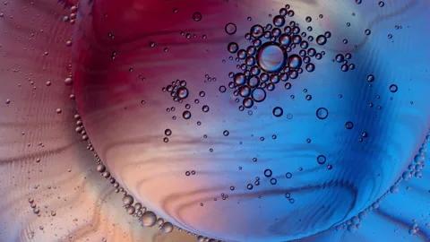 Research concept under a microscope, a large cell, small cells in it, visualized 스톡 동영상 130420387