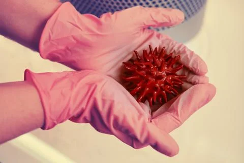 Research to develop a cure for coronavirus, concept. Hands in medical gloves  Stock Photos