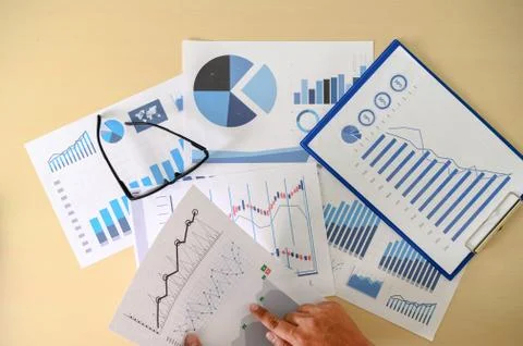 Research documents with analytics data Brainstorm Meeting Businessman financi Stock Photos