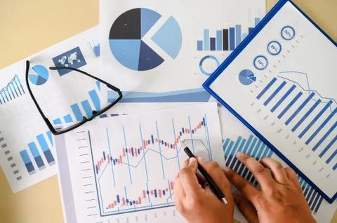 Research documents with analytics data Brainstorm Meeting Businessman financi Stock Photos