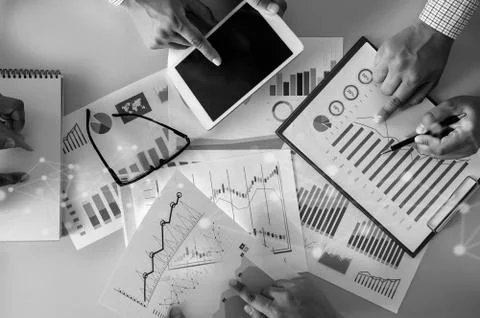 Research documents with analytics data Brainstorm Meeting Businessman financi Stock Photos