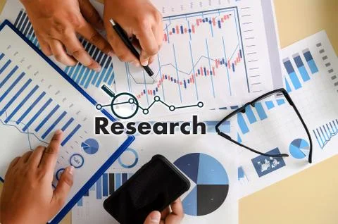 Research documents with analytics data Brainstorm Meeting Businessman financi Stock Photos