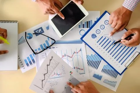 Research documents with analytics data Brainstorm Meeting Businessman financi Stock Photos
