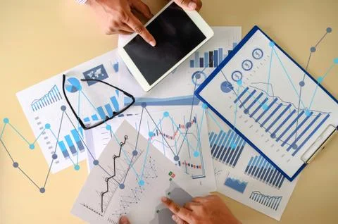 Research documents with analytics data Brainstorm Meeting Businessman financi Stock Photos