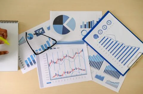 Research documents with analytics data Brainstorm Meeting Businessman financi Stock Photos