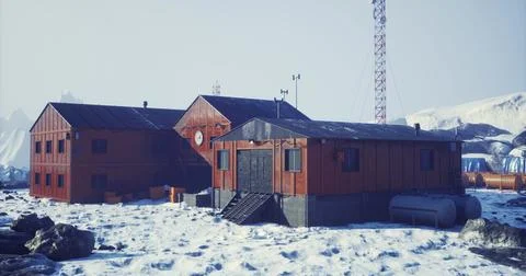 Research facility located in a snowy Antarctic landscape during winter daylig Stock Illustration