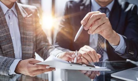 Research reports growth using pc computer looking at screen analyzing invest Stock Photos