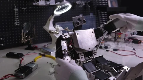 Research robot on the workbench Stock Footage 313837398