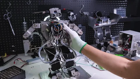 Research robot on the workbench Stock Footage 313839705