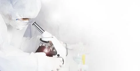 Research  scientist using a microscope in a laboratory, Concept science and T Stock Photos