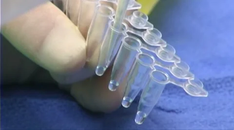 Research scientist using pipette zoom out 動画素材 1107518