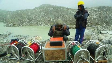 Research team using a terrameter at earthquake site Stock Footage 77451087