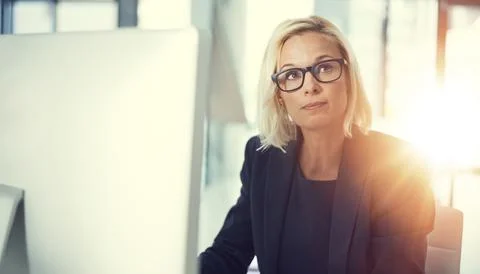 Research, thinking and computer with business woman in office for idea, credit Stock Photos