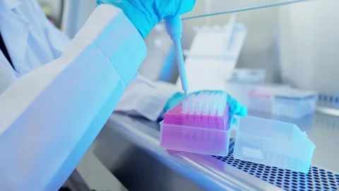 Researcher conducts experiments in a laboratory Stock Footage 334766781