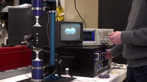 Researcher demonstrate acoustic levitation in lab Stock-Footage 93517853