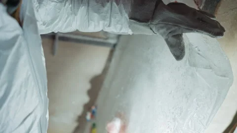 Researcher examines sample. Scientist handling icy specimen with care. Research Stock Footage 346470766