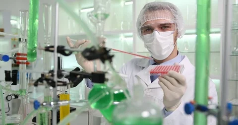 Researcher Man Presentation Biologist Looking Camera Hold Microplate Laboratory Stock Footage 81460784