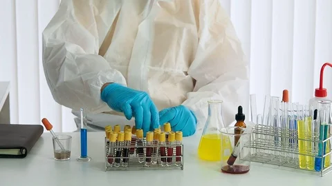 Researcher or scientists loads liquid sample into test tube in laboratory. Stock Footage 129560502