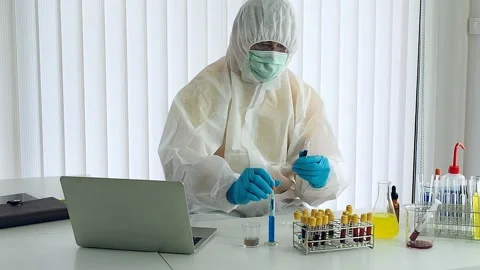 Researcher or scientists loads liquid sample into test tube in laboratory. Stock Footage 144093547