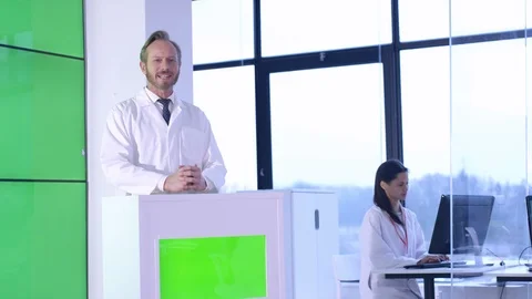 Researcher talking during presentation in front of green screen display Stock Footage 108186240