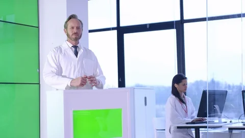 Researcher talking during presentation in front of green screen display Stock Footage 108186915