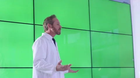 Researcher talking during presentation in front of green screen display Stock Footage 108187137
