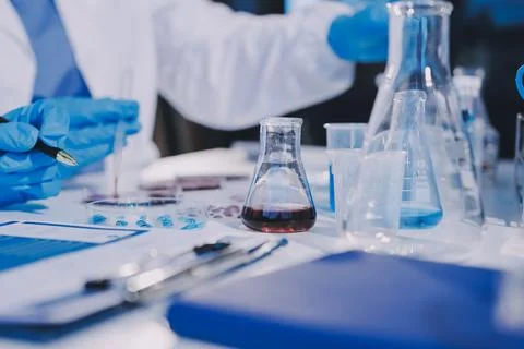 Researcher using a professional microscope Foto stock