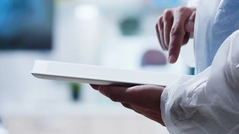 Researcher working on a digital tablet Stock Footage 113674473
