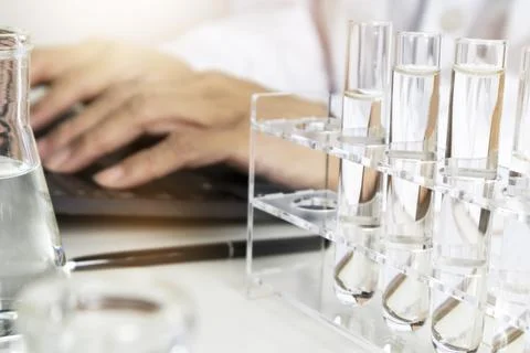 Researchers study data and experiment with chemicals, scientific process, r.. Stock Illustration