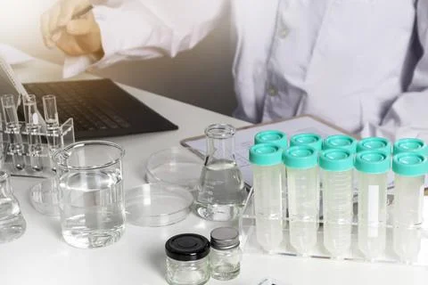 Researchers study data and experiment on chemicals, scientific process, dev.. Stock Illustration